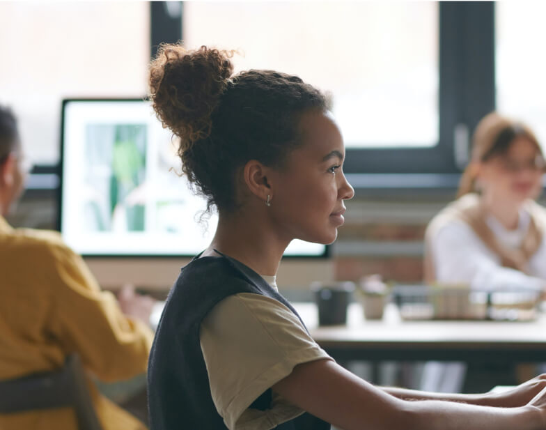 Woman sitting at the desk in an office