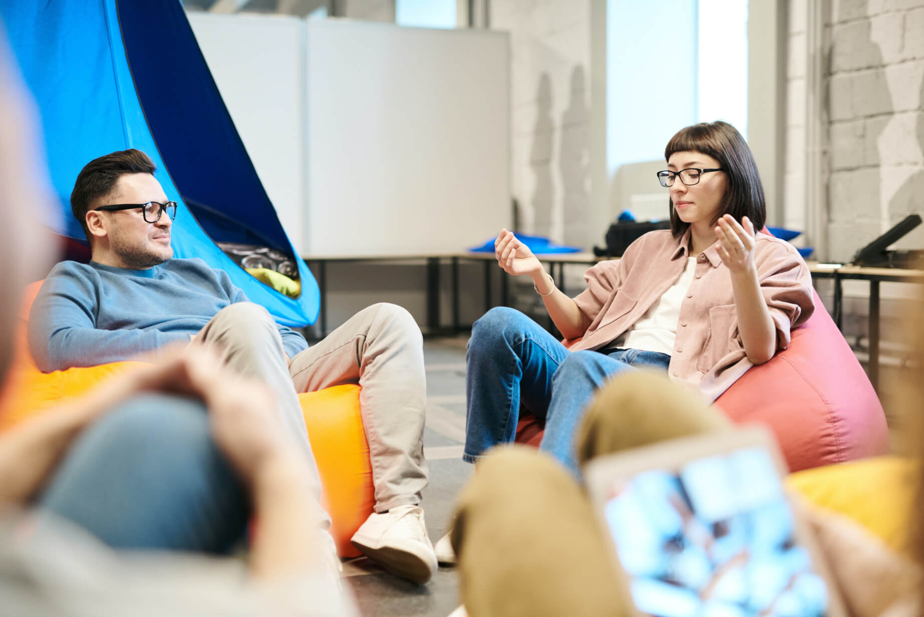 Woman and a man talking in a cafe 