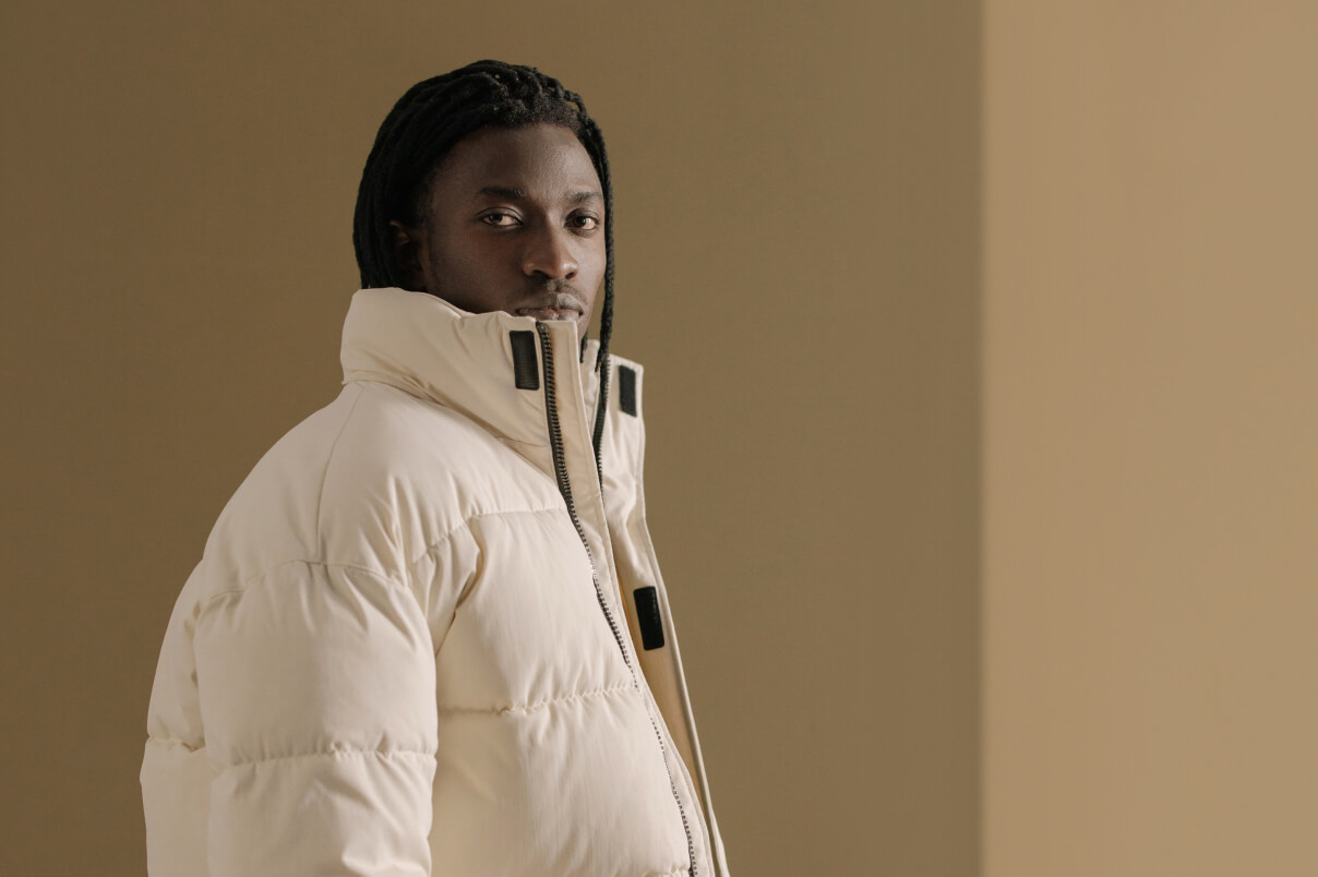 Man in a jacket looking at the viewer