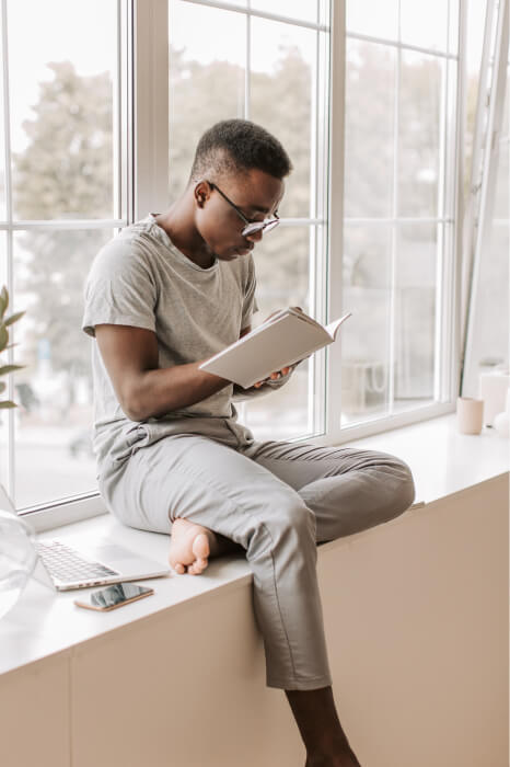 Person sitting by the window